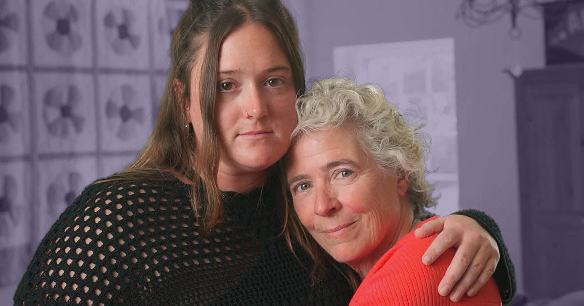 Alex Umble's mother and sister hugging and looking at the camera